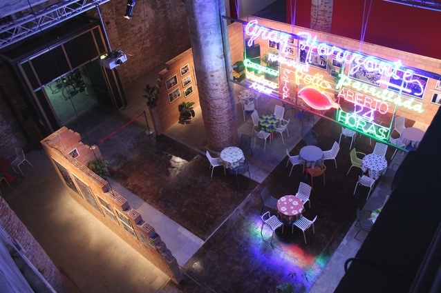 Pop-up restaurant constructed by Urban – Think Tank displaying Justin McGuirk’s urban photography.