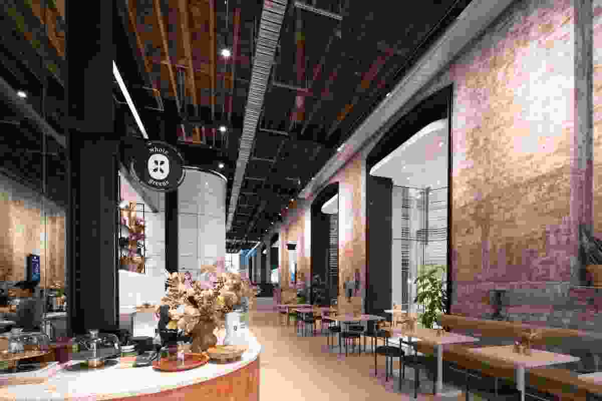 The entry lobby incorporates a cafe en route to the lift core, which overlooks the substation’s Machine Hall.