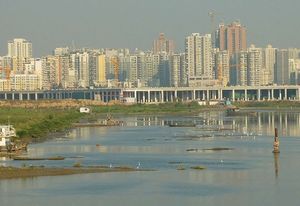 The site is mainly reclaimed land; the area has exceptionally poor water quality.