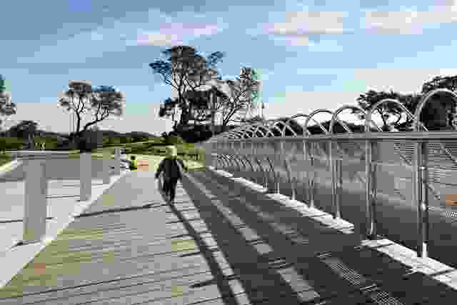 The bridge offers pedestrians a place to sit, rest, walk and view.