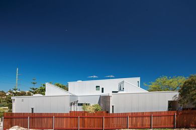 The four houses at 58 Stevens Street by Officer Woods read as a singular object.