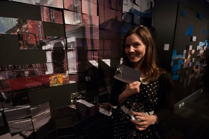 Lucy Fuchsbichler choosing a postcard of Home?.