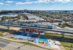 The Caulfield to Dandenong project creates 8.4-kilometres of linear park beneath the now-elevated rail line.