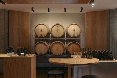 Operational wine barrels are scattered throughout the cellar door.