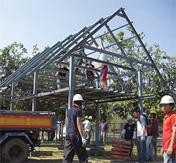 Students work with Dr David O’Brien to build a prototype sala in Nang Rong district, north-eastern Thailand. Photograph Hamish Hill.