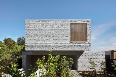 Artfully composed granite blocks reference civic buildings and create a sense of gravitas.