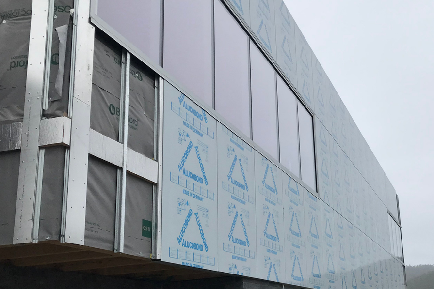Architect turns to Swisspearl in recladding of Launceston hospital ArchitectureAU