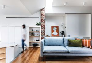 Aligned with a shift in floor level, a narrow skylight marks the point at which the addition and existing house adjoin. Artwork: Jai Vasicek.
