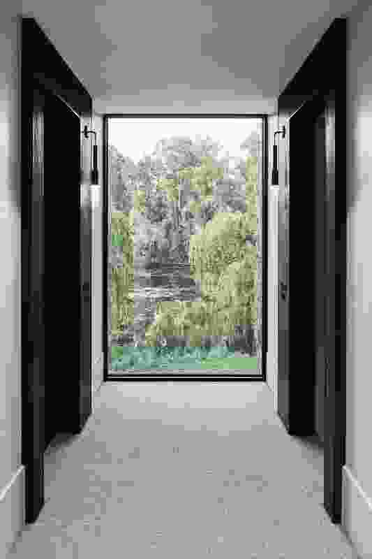 Framed vistas to the eucalypts and the river guide guests through the hotel passages.