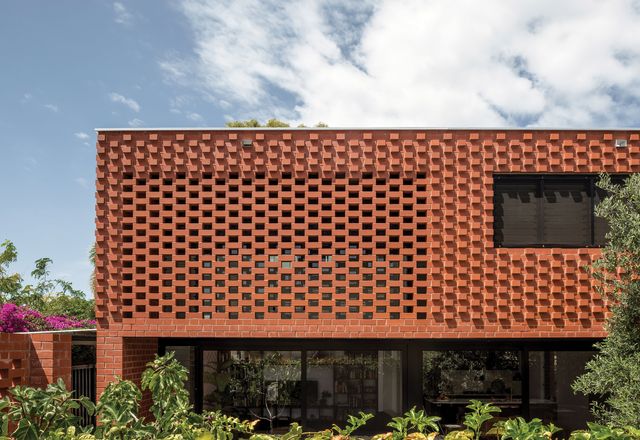  A contemporary twist on traditional Flemish bond brickwork makes for a highly textured facade.
