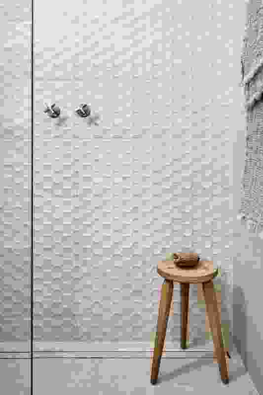 The creative use of tiles adds visual interest and brings a contemporary take to a well-loved home.