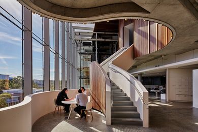 The glazed curtain wall of the new Novartis building works to explicitly communicate the transparency of the company’s practices and public presence.