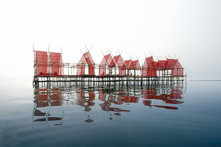 The design of the open water dining pavilion is a refreshing take on the widespread bamboo oyster scaffolding.