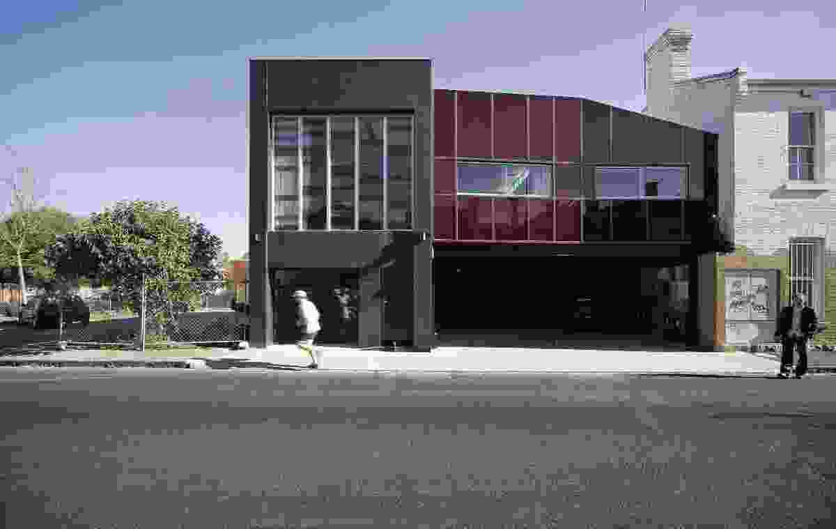 Windsor Loft 2006. The street elevation  features a red plastic facade, mirroring the extroverted character of the client. 