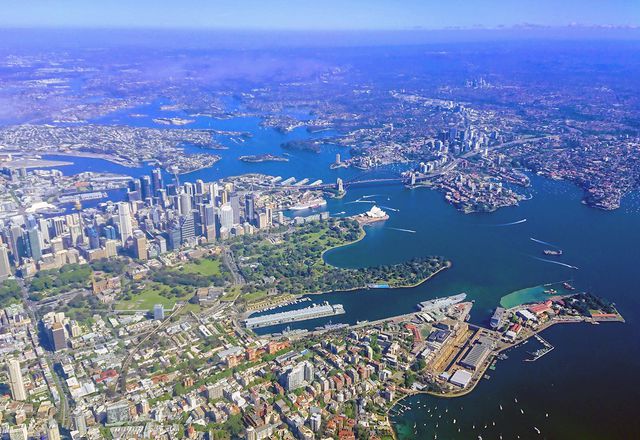 An aerial view of Sydney CBD, showing the Royal Botanic Garden Sydney, The Domain and the suburbs of Darlinghurst and Kings Cross.