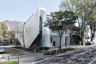 White tile cladding applied to the new component is reminiscent of the Sydney Opera House as well as the long association that Surry Hills has with the Portuguese community.