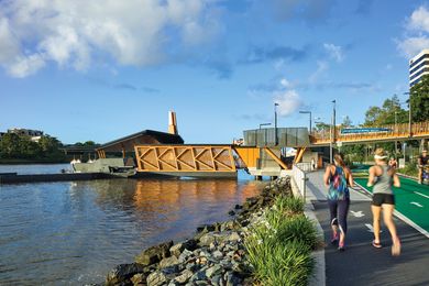 Access to and from the ferry terminals is enhanced by clear crossing points and visual clues along the riverside bike path, to minimize conflict between ferry passengers and cyclists.