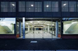  Kerr Street elevation. The six-metre-wide terrazzo arcade extends from Kerr Street to the laneway at the rear, providing pedestrian access. Image: Peter Bennetts.                  