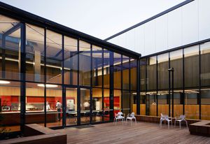 The central courtyard acts as a refuge for officers on duty and allows daylight into the interior.