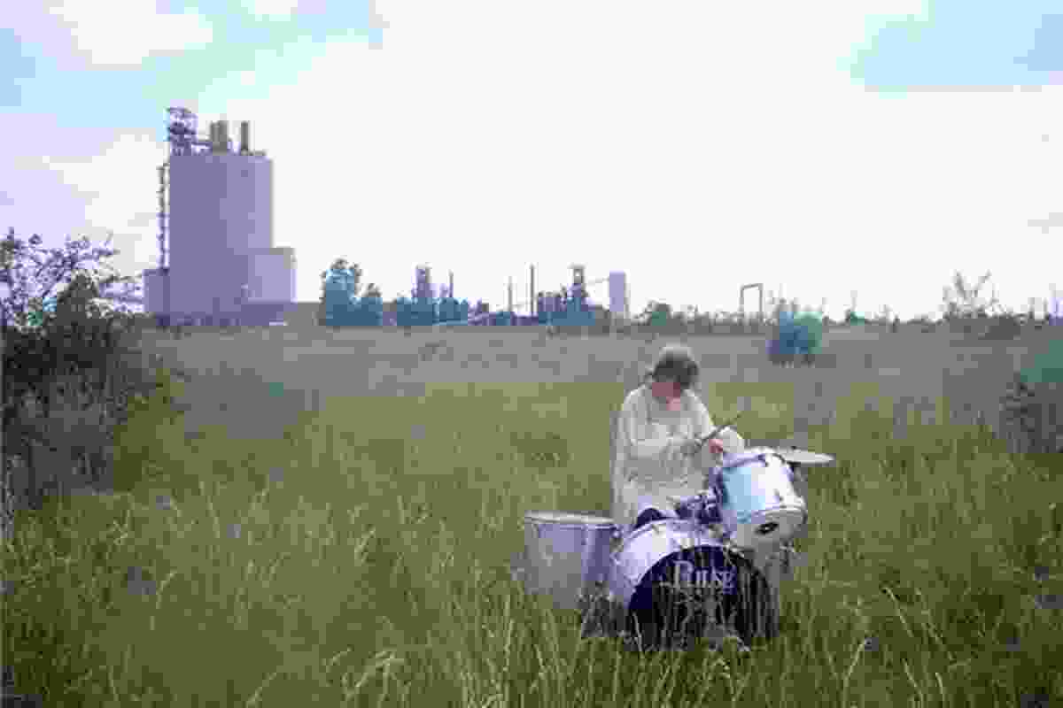 A digital video still from White Drummer Detroit.