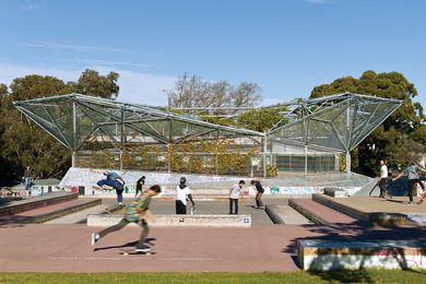 Climbing plants create a vertical green backdrop to the skate park.