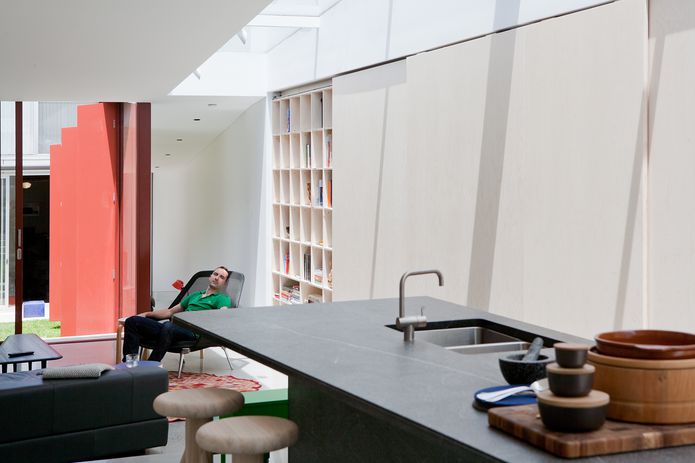 The living room in the Annandale House by CO-AP Architects is awash with natural light thanks to the setback from the northern boundary.