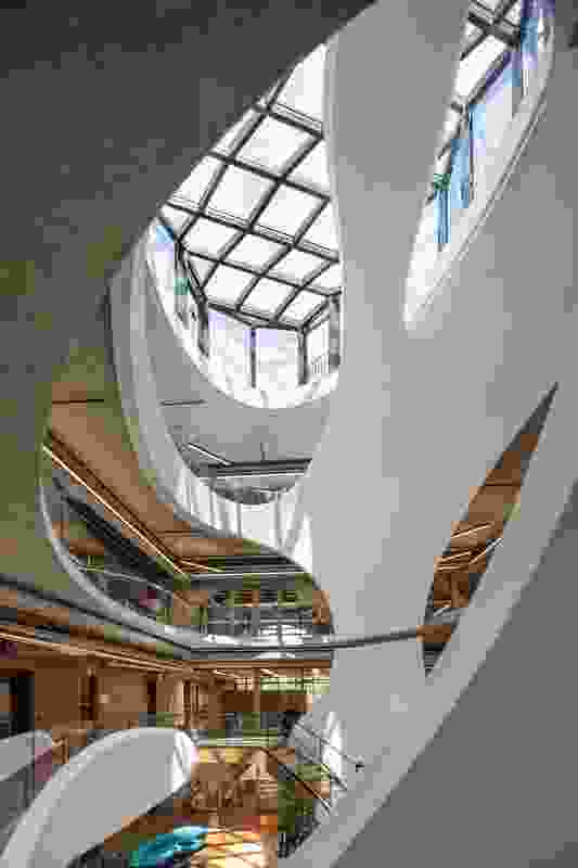 The atrium void breaks deep floor plates across five levels and gives the feeling that, within the building, you are part of something larger.