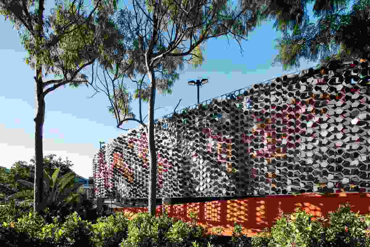 The Robina Town Centre’s carpark is now cloaked in a textural screen by Urban Art Projects, comprising laser-cut and folded metal panels.