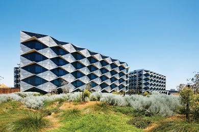 Chevron-shaped window hoods identify the principal inpatient, acute care wards of the main hospital building at Perth’s Fiona Stanley Hospital.