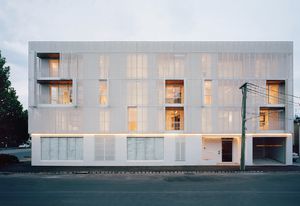 At night when the apartments are lit from within, the rhythm of life inside is projected on the building’s facade. Photograph: Rory Gardiner.