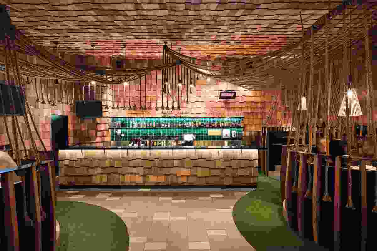 Timber shingles line walls, ceilings and bar fronts at this upper-floor bar.