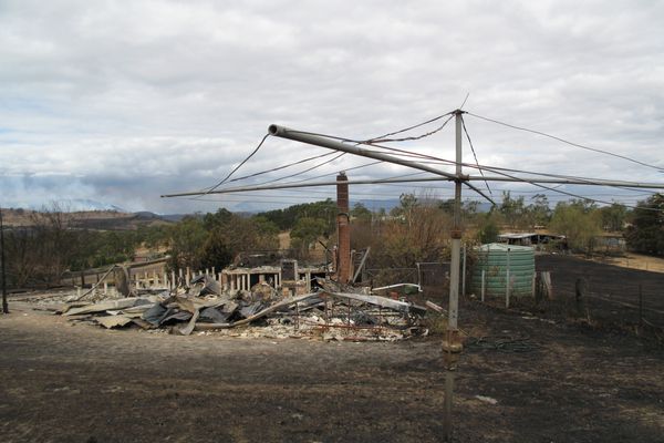 Bushfire damage to property just north of Yarra Glen, Victoria, with a Hills Hoist left standing.