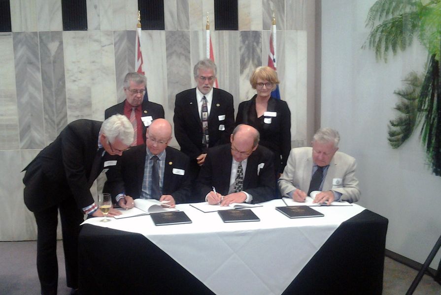 The signing took place at the New Zealand Parliament on 18 February 2015.