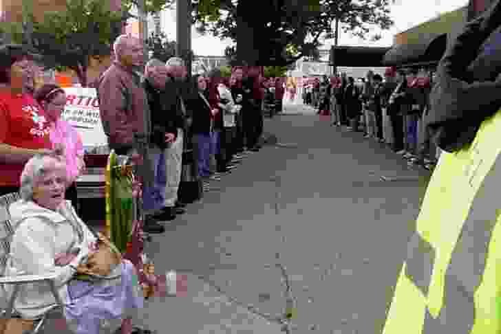 Pre-Easter anti-abortion protestors sidewalk queue in Louisville, Kentucky, April 2012.