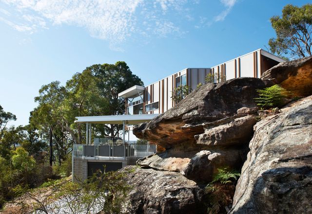 The King Residence perched on a rocky outcrop above Phegan’s Bay.
