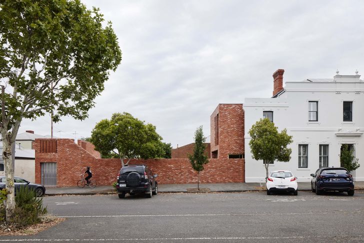 A utility space at the rear of the site is directly accessed from the side street.