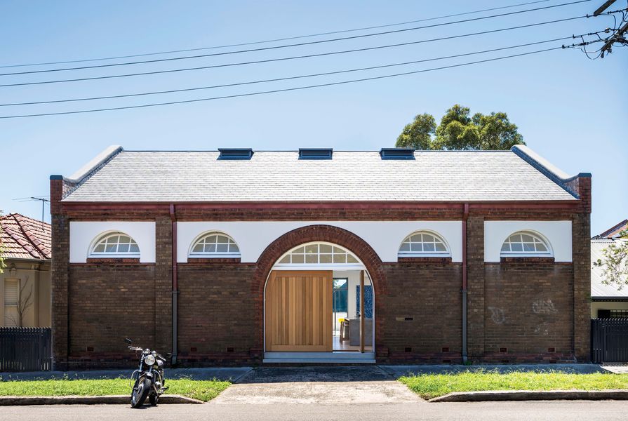 The original drill hall, built between 1904 and 1906, has been imaginatively restored and recast as a sophisticated three-storey home.