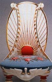 The full-size “lyrebird” chair is based on one of Henry’s designs and was commissioned by the Powerhouse Museum in 2000 from International Conservation Services, Sydney. The exhibition displays it surrounded by designs for the room in which it was to be located.