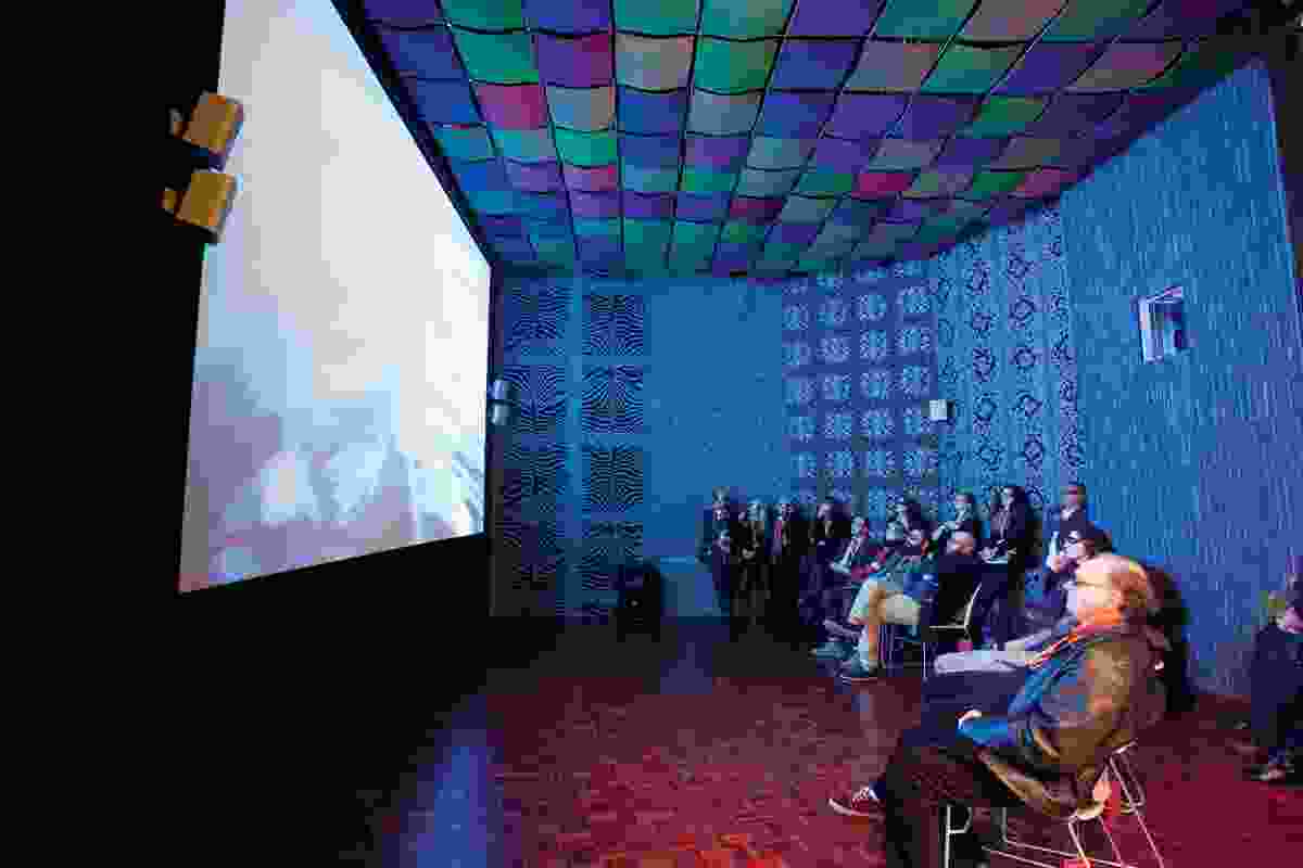 Visitors watch Now + When at a purpose-built 3D viewing room at the Object Gallery.