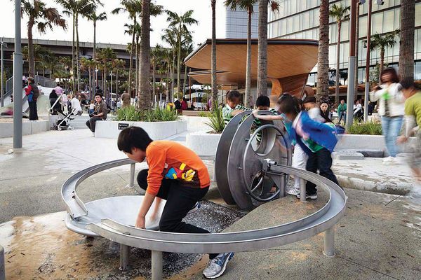 A water wheel allows kids to control the routing of water.