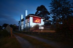 Mirror image: Reflective suburban house artwork highlights 'disappearing' home ownership aspirations