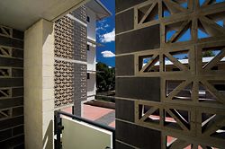  Materials are chosen for their inherent qualities. The breezeblocks of the private balcony provide adornment to the building facades. Image: Graham Philip 