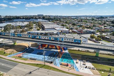 The Caulfield to Dandenong project creates 8.4-kilometres of linear park beneath the now-elevated rail line.