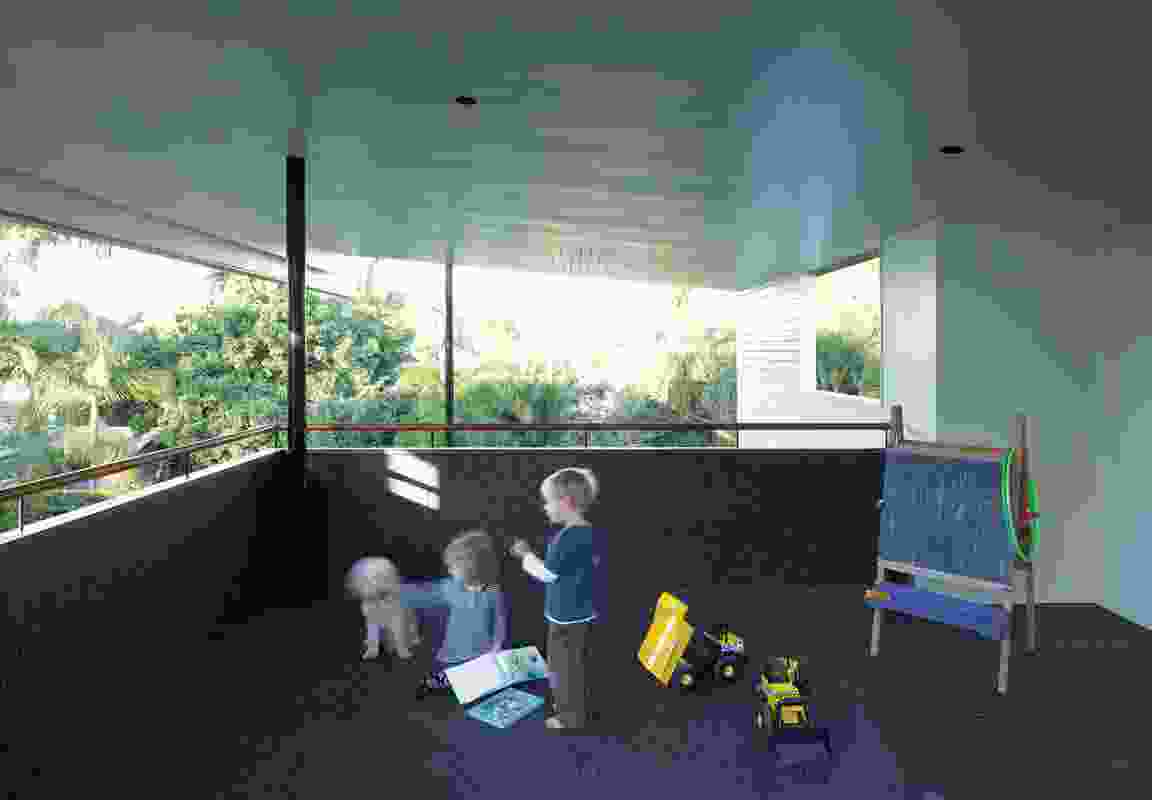 An upper-level deck contained within the generous roof overhang forms an all-weather playroom.