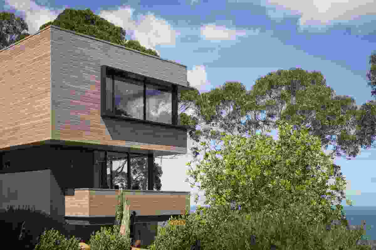 DecoClad V-groove aluminium cladding featured on house in Lorne, Victoria, finished in Decowood weathered timber.